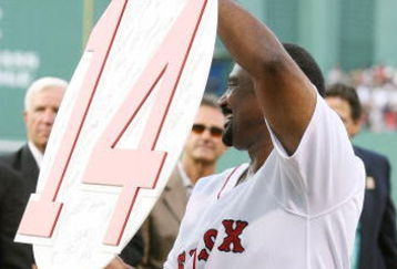 BOSTON - JULY 28:  Former Boston Red Sox outfielder Jim Rice shows off his retired number plaque during a ceremony before the Boston Red Sox game against the Oakland Athletics at Fenway Park July 28, 2009 in Boston, Massachusetts.  (Photo by Elsa/Getty Images)