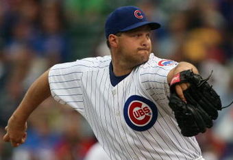 CHICAGO - JULY 8:  Aaron Heilman #47 of the Chicago Cubs pitches against the Atlanta Braves during the game on July 8, 2009 at Wrigley Field in Chicago, Illinois. (Photo by Jonathan Daniel/Getty Images) 