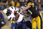 PITTSBURGH - NOVEMBER 16:  LaDanian Tomlinson #21 of the San Diego Chargers scores a first quarter touchdown while taking a hit from Troy Polamalu #43 of the Pittsburgh Steelers during the second quarter on November 16, 2008 at Heinz Field in Pittsburgh, Pennsylvania.  (Photo by Gregory Shamus/Getty Images)