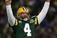 GREEN BAY, WI - JANUARY 20:  Quarterback Brett Favre #4 of the Green Bay Packers celebrates after throwing a 12 yard touchdown recption during the third quarter of the NFC championship game against the New York Giants on January 20, 2008 at Lambeau Field in Green Bay, Wisconsin.  (Photo by Jonathan Daniel/Getty Images)