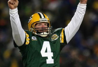 GREEN BAY, WI - JANUARY 20:  Quarterback Brett Favre #4 of the Green Bay Packers celebrates after throwing a 12 yard touchdown recption during the third quarter of the NFC championship game against the New York Giants on January 20, 2008 at Lambeau Field in Green Bay, Wisconsin.  (Photo by Jonathan Daniel/Getty Images)