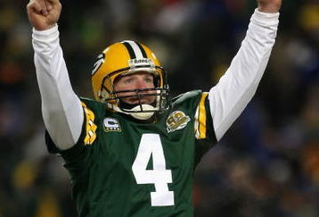 GREEN BAY, WI - JANUARY 20:  Quarterback Brett Favre #4 of the Green Bay Packers celebrates after throwing a 12 yard touchdown recption during the third quarter of the NFC championship game against the New York Giants on January 20, 2008 at Lambeau Field in Green Bay, Wisconsin.  (Photo by Jonathan Daniel/Getty Images)