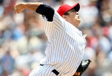 NEW YORK - JULY 04:  Chien-Ming Wang #40 of the New York Yankees pitches against the Toronto Blue Jays on July 4, 2009 at Yankee Stadium in the Bronx borough of New York City.  (Photo by Nick Laham/Getty Images)