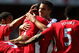 LONDON, ENGLAND - MAY 24:  Robin Van Persie of Arsenal celebrates after scoring his team's second goal during the Barclays Premier League match between Arsenal and Stoke City at Emirates Stadium on May 24, 2009 in London, England.  (Photo by Ryan Pierse/Getty Images)