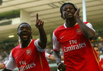 LONDON - SEPTEMBER 15: Kolo Toure and Emmanuel Adebayor of Arsenal celebrate a goal during the Barclays Premier League match between Tottenham Hotspur and Arsenal at White Hart Lane on September 15, 2007 in London, England.  (Photo by Ryan Pierse/Getty Images)