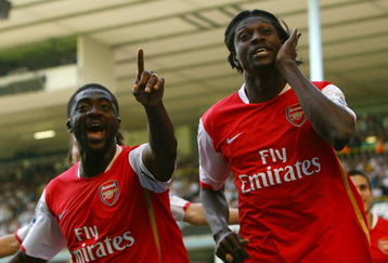 LONDON - SEPTEMBER 15: Kolo Toure and Emmanuel Adebayor of Arsenal celebrate a goal during the Barclays Premier League match between Tottenham Hotspur and Arsenal at White Hart Lane on September 15, 2007 in London, England.  (Photo by Ryan Pierse/Getty Images)