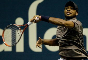 BANGKOK, THAILAND - SEPTEMBER 24:  Donald Young of the USA returns a shot in his match against Jurgen Melzer of Austria on day two of the Thailand Open at Impact Arena on September 24, 2008 in Bangkok, Thailand.  (Photo by Robert Cianflone/Getty Images)