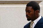 RICHMOND, VA - AUGUST 27:  Atlanta Falcons quarterback Michael Vick arrives at federal court August 27, 2007 in Richmond, Virginia. The football star was expected to plead guilty to a federal dogfighting conspiracy charge. The NFL has suspended Vick indefinitely.   (Photo by Win McNamee/Getty Images)