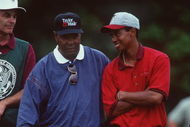 27 Aug 1995: Tiger Woods shares a smile with his father, Earl, during a round of competition in the 1995 U.S. Amatuer Championships held at the Newport Country Club in Newport, Rhode Island. Mandatory Credit: J.D. Cuban/Allsport