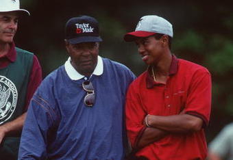 27 Aug 1995:  Tiger Woods shares a smile with his father, Earl, during a round of competition in the 1995 U.S. Amatuer Championships held at the Newport Country Club in Newport, Rhode Island.   Mandatory Credit: J.D. Cuban/Allsport