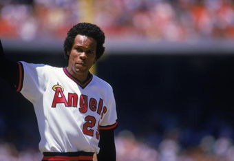 ANAHEIM, CA - AUGUST 4:  Infielder Rod Carew #29 of the California Angels waves to the home crowd after making his 3,000th hit by singling against his former club, the Minnesota Twins during the MLB game at Angel Stadium on August 4, 1985 in Anaheim, California. The Angels defeated the Twins 6-5. (Photo by Getty Images)