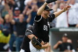 CHICAGO, IL - JULY 23: Pitcher Mark Buehrle #56 of the Chicago White Sox celebrates after pitching a perfect game as he is grabbed by first baseman Josh Fields #7 against the Tampa Bay Rays at U.S. Cellular Field on July 23, 2009 in Chicago, Illinois. The White Sox defeated the Rays 5-0, as Buehrle became the 18th pitcher in 132 years of major league baseball to throw a perfect game. (Photo by Scott Boehm/Getty Images)