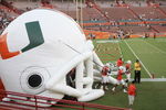MIAMI - OCTOBER 14:  Miami Hurricanes players enter the field through a giant inflatable helmet before the game against the Florida International Panthers at the Orange Bowl on October 14, 2006 in Miami, Florida. Miami won 35-0.  (Photo by Marc Serota/Getty Images)