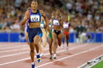 30 Sep 2000:  Marion Jones of the USA on her way to winning Gold in the Womens 4x400m Relay Final at the Olympic Stadium on Day 15 of the Sydney 2000 Olympic Games in Sydney, Australia. \ Mandatory Credit: Andy Lyons /Allsport