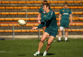SYDNEY, AUSTRALIA - JULY 29:  Berrick Barnes of the Wallabies passes the ball during an Australian Wallabies training session at Leichhardt Oval on July 29, 2009 in Sydney, Australia.  (Photo by Cameron Spencer/Getty Images)