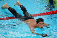 ROME - JULY 28:  Michael Phelps of United States competes in the Men's 200m Butterfly Semi Final during the 13th FINA World Championships at the Stadio del Nuoto on July 28, 2009 in Rome, Italy.  (Photo by Clive Rose/Getty Images)