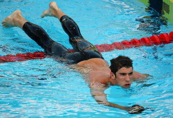ROME - JULY 28:  Michael Phelps of United States competes in the Men's 200m Butterfly Semi Final during the 13th FINA World Championships at the Stadio del Nuoto on July 28, 2009 in Rome, Italy.  (Photo by Clive Rose/Getty Images)