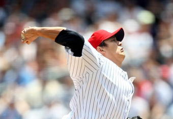 NEW YORK - JULY 04:  Chien-Ming Wang #40 of the New York Yankees pitches against the Toronto Blue Jays on July 4, 2009 at Yankee Stadium in the Bronx borough of New York City.  (Photo by Nick Laham/Getty Images)