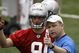ALLEN PARK, MI - MAY 01:  Offensive coordinator Scott Linehan of the Detroit Lions talks with Matthew Stafford #9 during rookie orientation camp at the Detroit Lions Headquarters and Training Facility on May 1, 2009 in Allen Park, Michigan.  (Photo by Gregory Shamus/Getty Images)