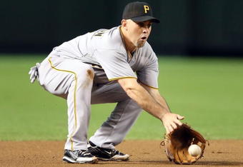 PHOENIX - JULY 25:  Infielder Jack Wilson #2 of the Pittsburgh Pirates fields a ground ball out against the Arizona Diamondbacks during the major league baseball game at Chase Field on July 25, 2009 in Phoenix, Arizona.  (Photo by Christian Petersen/Getty Images)