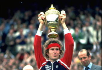 JUL 1981:  JOHN MCENROE OF THE UNITED STATES LIFTS THE TROPHY OVER HIS HEAD AFTER WINNING THE 1981 WIMBLEDON TENNIS CHAMPIONSHIPS.