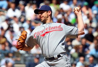 NEW YORK - APRIL 16:  Cliff Lee #31 of the Cleveland Indians pitches against the New York Yankees during opening day at the new Yankee Stadium on April 16, 2009 in the Bronx borough of New York City. This is the first regular season MLB game being played at the new venue which replaced the old Yankee Stadium as the Yankees home field.  (Photo by Jim McIsaac/Getty Images)