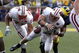 ANN ARBOR, MI - SEPTEMBER 27: Allan Evridge #4 of the Wisconsin Badgers fumbles the ball late in the forth quarter on a hit by Brandon Graham #55 of the Michigan Wolverines on September 27, 2008 at Michigan Stadium in Ann Arbor, Michigan. (Photo by Gregory Shamus/Getty Images)