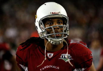 TAMPA, FL - FEBRUARY 01:  Larry Fitzgerald #11 of the Arizona Cardinals looks on from the sideline against the Pittsburgh Steelers during Super Bowl XLIII on February 1, 2009 at Raymond James Stadium in Tampa, Florida. The Steelers won 27-23.  (Photo by Chris Graythen/Getty Images)