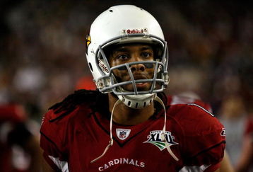 TAMPA, FL - FEBRUARY 01:  Larry Fitzgerald #11 of the Arizona Cardinals looks on from the sideline against the Pittsburgh Steelers during Super Bowl XLIII on February 1, 2009 at Raymond James Stadium in Tampa, Florida. The Steelers won 27-23.  (Photo by Chris Graythen/Getty Images)