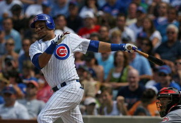 CHICAGO - JULY 26: Aramis Ramirez #16 of the Chicago Cubs hits a run-scoring double in the 7th inning against the Cincinnati Reds on July 26, 2009 at Wrigley Field in Chicago, Illinois. The Cubs defeated the Reds 5-2.  (Photo by Jonathan Daniel/Getty Images)
