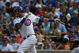 CHICAGO - JULY 26: Aramis Ramirez #16 of the Chicago Cubs hits a run-scoring double in the 7th inning against the Cincinnati Reds on July 26, 2009 at Wrigley Field in Chicago, Illinois. The Cubs defeated the Reds 5-2. (Photo by Jonathan Daniel/Getty Images)