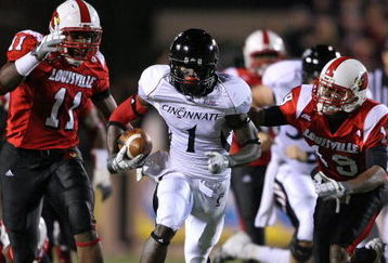 LOUISVILLE, KY - NOVEMBER 14: Mardy Gilyard # 1 of the Cincinnati Bearcats runs for a touchdown during the Big East Conference game against the Louisville Cardinals on November 14, 2008 at  Papa John's Stadium in Louisville, Kentucky.  (Photo by Andy Lyons/Getty Images)
