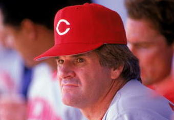1985:  Pete Rose of the Cincinnati Reds watches from the dug-out during a MLB game in the 1985 season. ( Photo by: Rick Stewart/Getty Images)