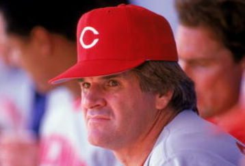 1985:  Pete Rose of the Cincinnati Reds watches from the dug-out during a MLB game in the 1985 season. ( Photo by: Rick Stewart/Getty Images)