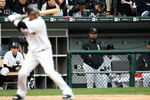CHICAGO - OCTOBER 05:  Manager Ozzie Guillen #13 of the Chicago White Sox looks on as Orlando Cabrera #18 bats against the Tampa Bay Rays in Game Three of the ALDS during the 2008 MLB Playoffs at U.S. Cellular Field on October 5, 2008 in Chicago, Illinois.  (Photo by Jamie Squire/Getty Images)