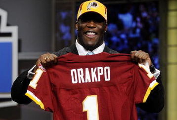 NEW YORK - APRIL 25:   Washington Redskins #13 draft pick Brian Orakpo poses for photographers at Radio City Music Hall for the 2009 NFL Draft on April 25, 2009 in New York City  (Photo by Jeff Zelevansky/Getty Images)