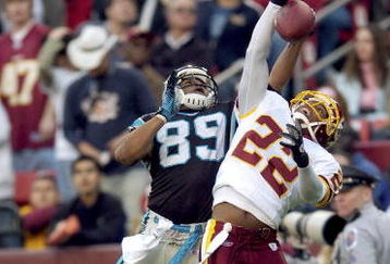 LANDOVER, MD - NOVEMBER 26:  Carlos Rogers #22 of the Washington Redskins knocks the ball away from Steve Smith #89 of the Carolina Panthers November 26, 2006 at FedEx Field in Landover, Maryland. The Redskins won the game, 17-13.  (Photo by Greg Fiume/Getty Images)  