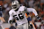 DENVER - NOVEMBER 23:  Derrick Burgess #56 of the Oakland Raiders rushes against the Denver Broncos during week 12 NFL action at Invesco Field at Mile High on November 23, 2008 in Denver, Colorado. Fargas rushed for 107 yards as the Raiders defeated the Broncos 31-10.  (Photo by Doug Pensinger/Getty Images)