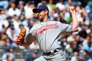 NEW YORK - APRIL 16:  Cliff Lee #31 of the Cleveland Indians pitches against the New York Yankees during opening day at the new Yankee Stadium on April 16, 2009 in the Bronx borough of New York City. This is the first regular season MLB game being played at the new venue which replaced the old Yankee Stadium as the Yankees home field.  (Photo by Jim McIsaac/Getty Images)