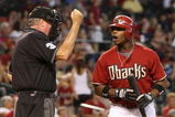 PHOENIX - JULY 26: Justin Upton #10 of the Arizona Diamondbacks reacts to home plate umpire Tim Welke after a called strike during the major league baseball game against the Pittsburgh Pirates at Chase Field on July 26, 2009 in Phoenix, Arizona. The Diamondbacks defeated the Pirates 9-0. (Photo by Christian Petersen/Getty Images)