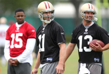 SANTA CLARA, CA - MAY 01:  Michael Crabtree #15 of the San Francisco 49ers looks on during practice as quaterback Alex Smith #11 and Shaun Hill #13 practice during the 49ers Minicamp at their training facilities on May 1, 2009 in Santa Clara, California. (Photo by Jed Jacobsohn/Getty Images)