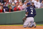 BOSTON - MAY 17:  Bill Hall #2 of the Milwaukee Brewers reacts after committing an error on a ball hit by Kevin Youkilis #20 of the Boston Red Sox to knock in a run during the second game of a doubleheader at Fenway Park on May 17, 2008 in Boston, Massachusetts. (Photo by Jim Rogash/Getty Images)