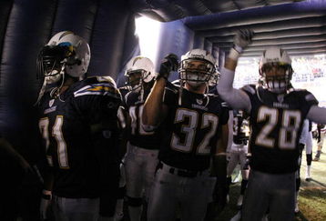 SAN DIEGO - DECEMBER 24:  LaDainian Tomlinson #21, Eric Weddle #32, and Steve Gregory #28 of the San Diego Chargers prepare to enter the game against the Denver Broncos during the first half of their NFL game at Qualcomm Stadium December 24, 2007 in San Diego, California.  (Photo by Donald Miralle/Getty Images)