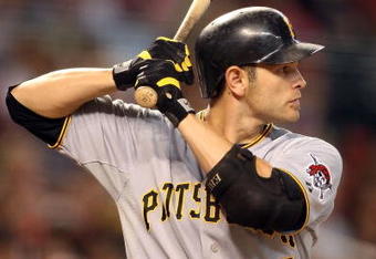 PHOENIX - JULY 23:  Freddy Sanchez #12 of the Pittsburgh Pirates bats against the Arizona Diamondbacks during the major league baseball game at Chase Field on July 23, 2009 in Phoenix, Arizona. The Diamondbacks defeated the Pirates 11-4. (Photo by Christian Petersen/Getty Images)