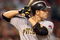 PHOENIX - JULY 23:  Freddy Sanchez #12 of the Pittsburgh Pirates bats against the Arizona Diamondbacks during the major league baseball game at Chase Field on July 23, 2009 in Phoenix, Arizona. The Diamondbacks defeated the Pirates 11-4. (Photo by Christian Petersen/Getty Images)