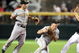PHOENIX - JULY 25: Infielder Jack Wilson #2 of the Pittsburgh Pirates bobbles the ball after getting the force out on Stephen Drew #6 of the Arizona Diamondbacks during the first inning of the major league baseball game at Chase Field on July 25, 2009 in Phoenix, Arizona. (Photo by Christian Petersen/Getty Images)