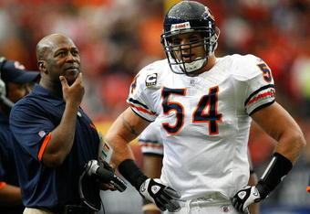 ATLANTA - OCTOBER 12:  Head coach Lovie Smith (L) and Brian Urlacher #54 of the Chicago Bears watch the replay during an official review in the game against the Atlanta Falcons at the Georgia Dome on October 12, 2008 in Atlanta, Georgia.  (Photo by Kevin C. Cox/Getty Images)
