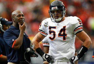 ATLANTA - OCTOBER 12:  Head coach Lovie Smith (L) and Brian Urlacher #54 of the Chicago Bears watch the replay during an official review in the game against the Atlanta Falcons at the Georgia Dome on October 12, 2008 in Atlanta, Georgia.  (Photo by Kevin C. Cox/Getty Images)