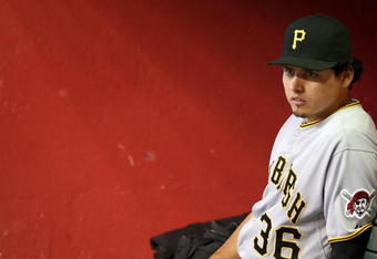 PHOENIX - JULY 26:  Luis Cruz #36 of the Pittsburgh Pirates watches from the dugout during the major league baseball game against  the Arizona Diamondbacks at Chase Field on July 26, 2009 in Phoenix, Arizona. The Diamondbacks defeated the Pirates 9-0.  (Photo by Christian Petersen/Getty Images)
