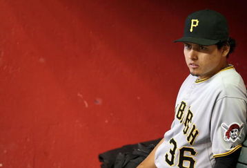 PHOENIX - JULY 26:  Luis Cruz #36 of the Pittsburgh Pirates watches from the dugout during the major league baseball game against  the Arizona Diamondbacks at Chase Field on July 26, 2009 in Phoenix, Arizona. The Diamondbacks defeated the Pirates 9-0.  (Photo by Christian Petersen/Getty Images)